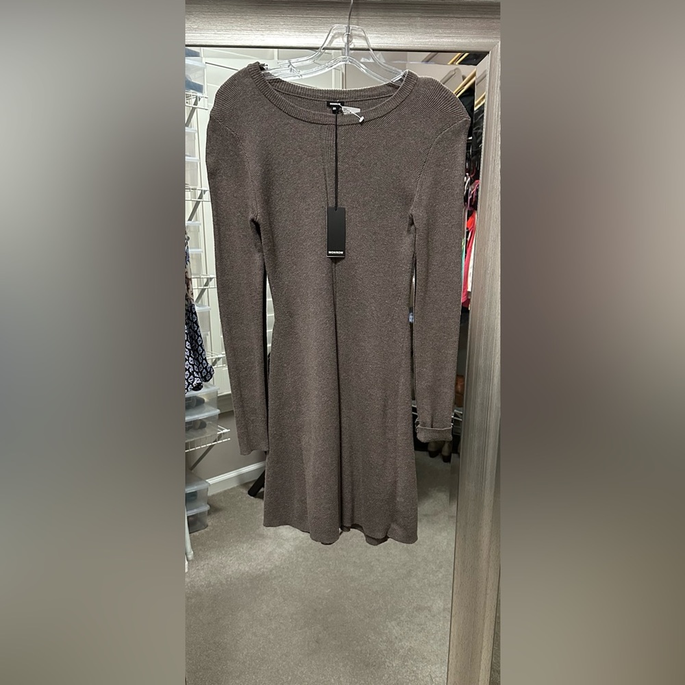 Beautiful knitted dress brand new with tags. $50 off.